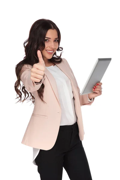 Happy business woman with tablet making ok sign — Stock Photo, Image