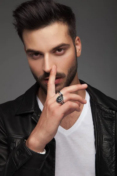 Sexy man touching his nose — Stock Photo, Image