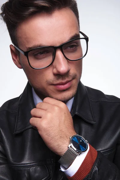 Closeup of a young casual man sthinking — Stock Photo, Image