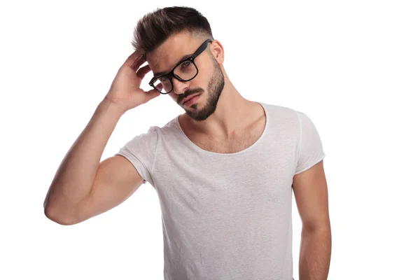 Sexy casual man fixing his hair style — Stock Photo, Image