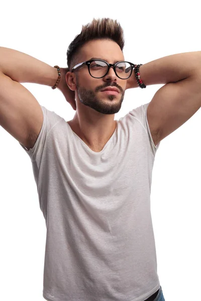 Side view of a man with hands behind his head — Stock Photo, Image