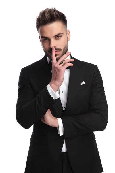 Elegant man in tuxedo is thinking — Stock Photo, Image