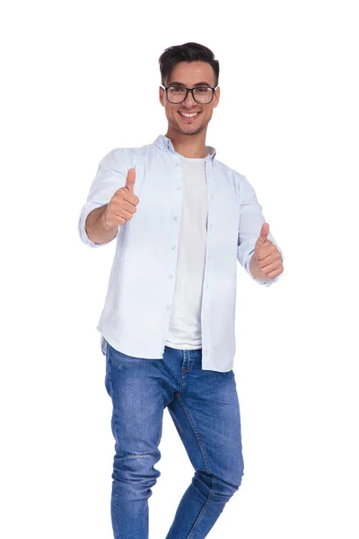 Young casual man wearing glasses makes the ok sign — Stock Photo, Image