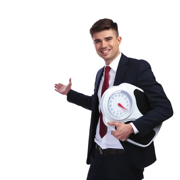 Hombre de negocios feliz recomienda comer sano — Foto de Stock