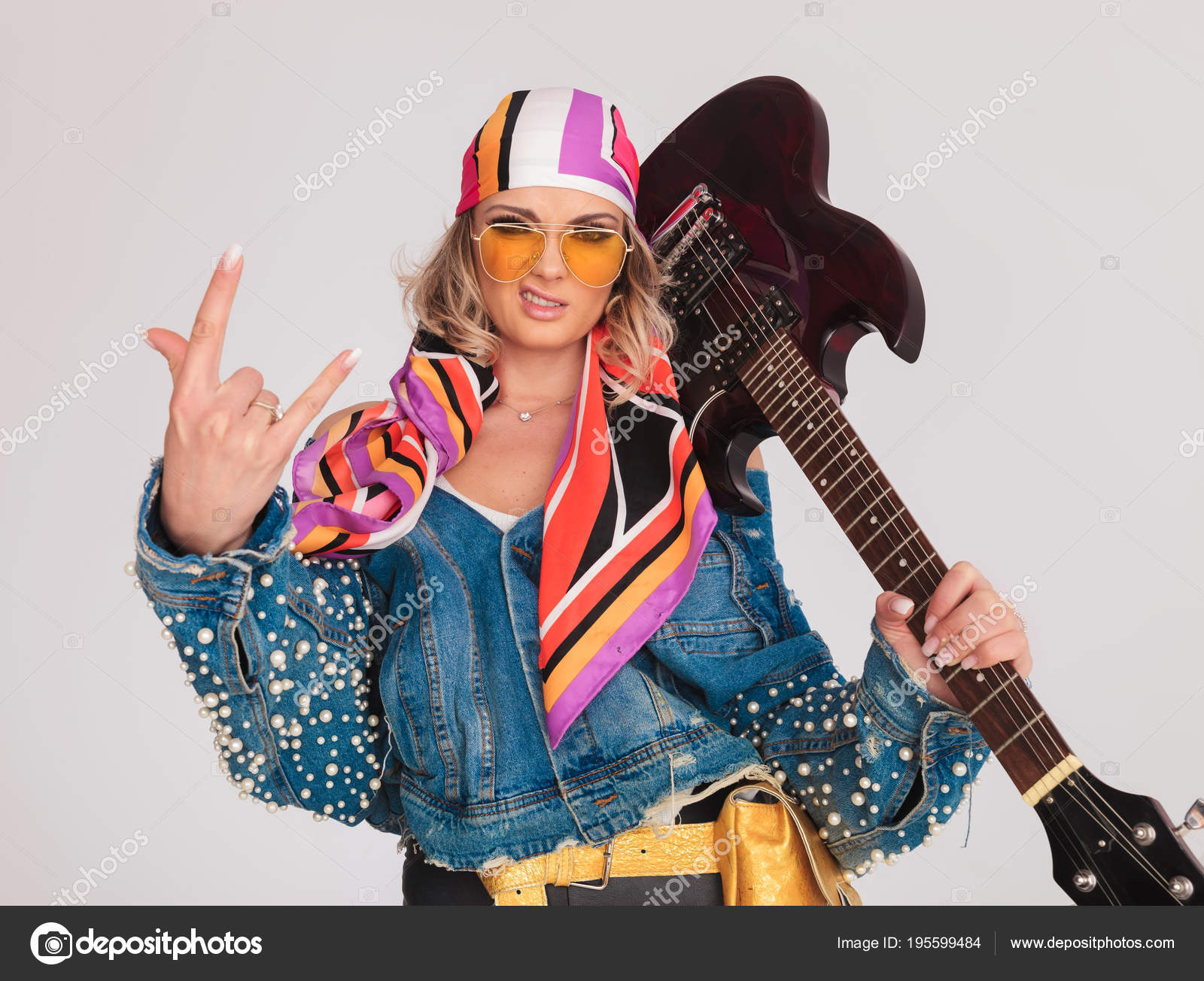 Rock and Roll Man with Guitar on Shoulder Embracing Woman Stock Image -  Image of leather, hold: 99189689