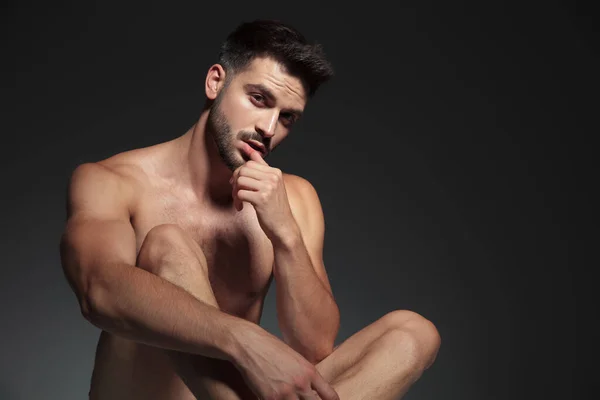 Sensual naked man touching lips on grey background — Stok fotoğraf