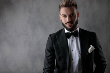 businessman sitting and looking at camera happy