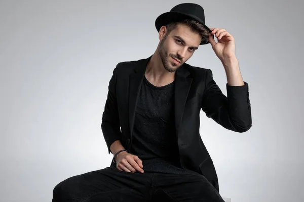 Sexy fashion model wearing black hat and smiling — Stok fotoğraf