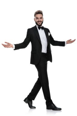 businessman walking aside and greeting with open arms happy