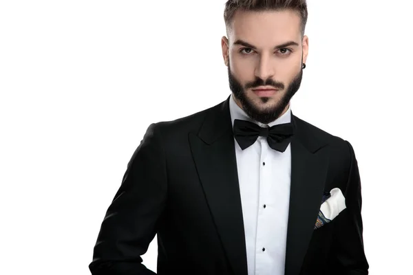 Sexy businessman standing and looking at camera serious — Stok fotoğraf