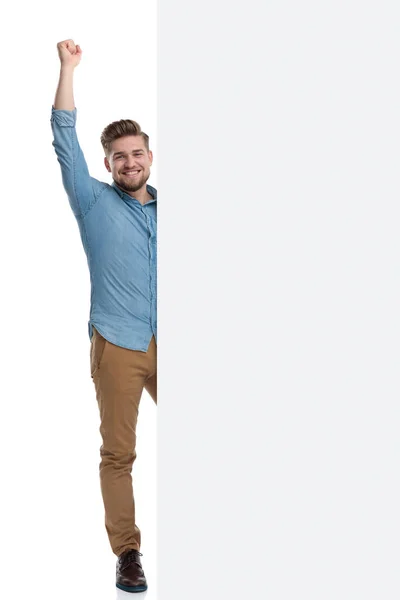 Happy Casual Man Celebrating His Fist Air Blank Billboard While — Stock Photo, Image