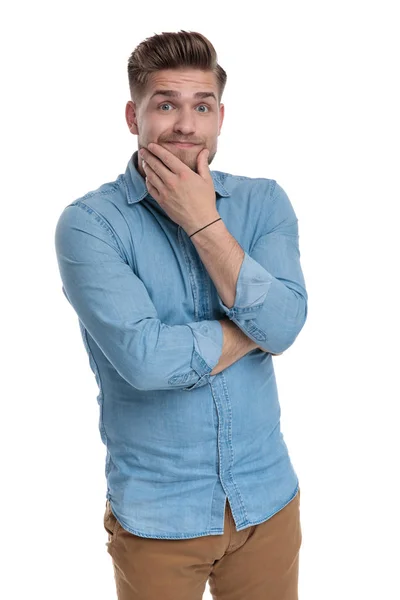 Thoughtful Casual Man Making Funny Face Holding His Hand His — Stock Photo, Image