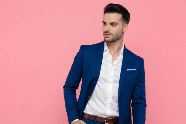 Charming Businessman Looking Away Smiling While Wearing Blue Suit Standing — Stock Photo, Image