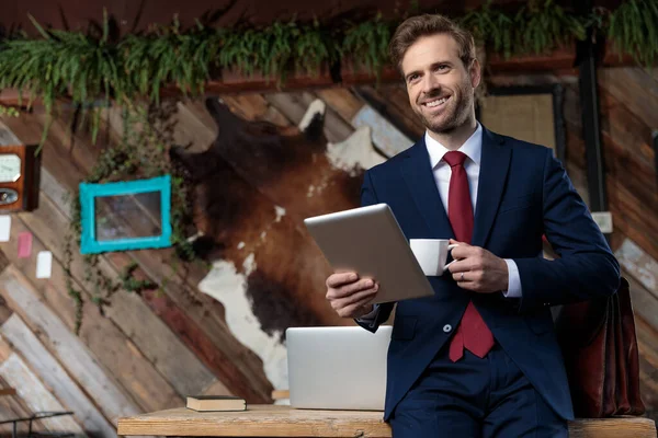 Smiling Young Businessman Holding Tab Drinking Coffee Sitting Coffeeshop — Stock Photo, Image