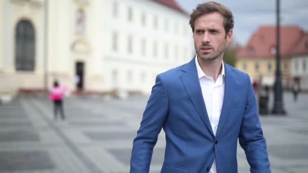 Young Businessman Wearing Navy Suit Walking Looking Away Serious City — Stock Video