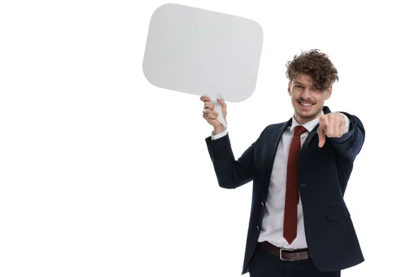 Positive Businessman Holding Speech Bubble Pointing Smiling While Wearing Suit — Stock Photo, Image