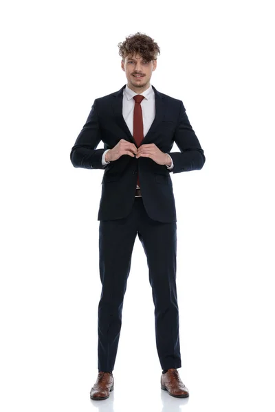 Positive Businessman Smiling Unbuttoning His Jacket While Wearing Suit Standing — Stock Photo, Image