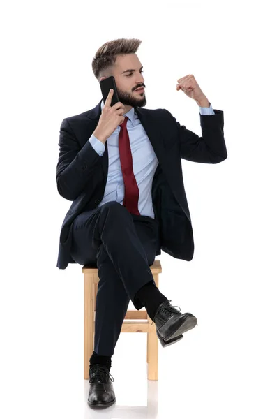 Excited Young Businessman Talking Phone Celebrating Victory Holding Fist Looking — Stock Photo, Image