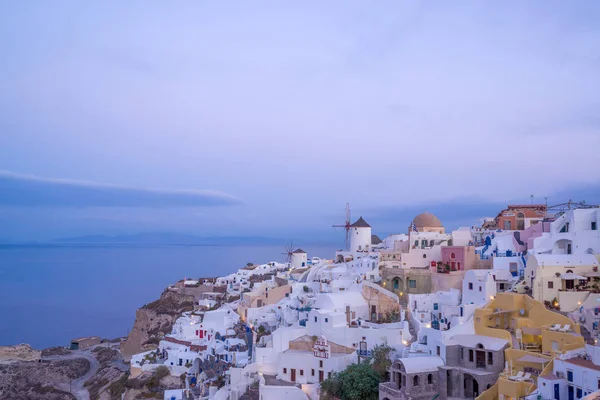 Oia village at sunset, Santorini island — Stock Photo, Image