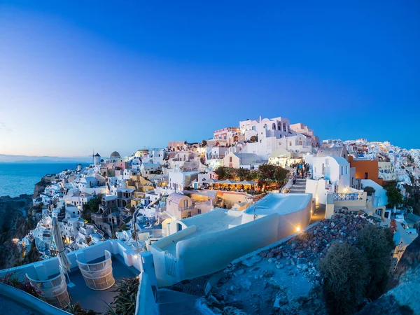 Oia village at sunset, Santorini island — Stock Photo, Image