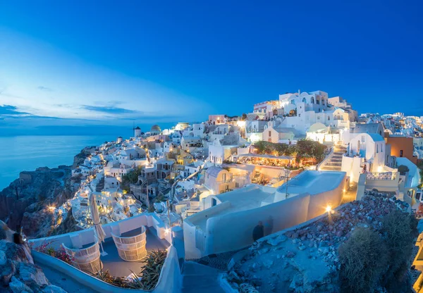 Oia villaggio al tramonto, isola di Santorini — Foto Stock