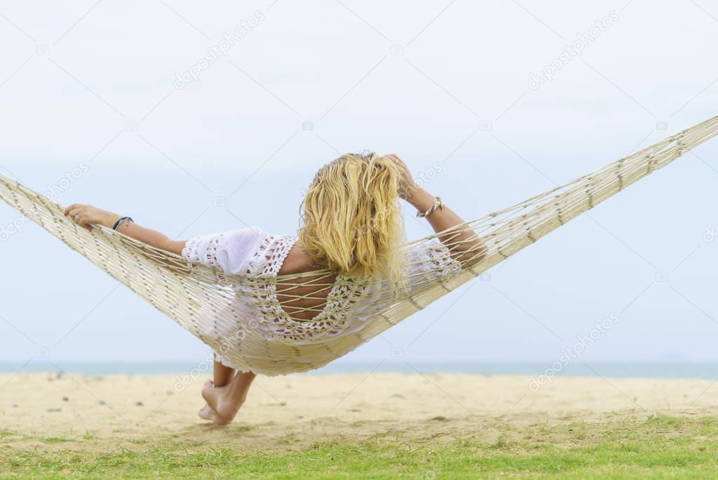 Woman relaxing at the beach