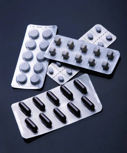 Different pills and tablets in blisterpack — Stock Photo, Image