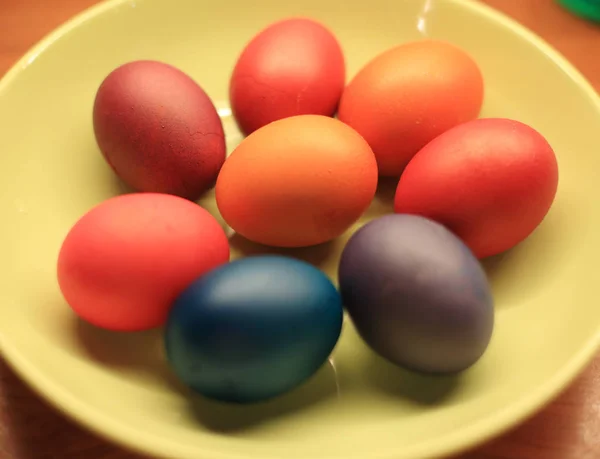 Colorful easter eggs in plate Royalty Free Stock Photos