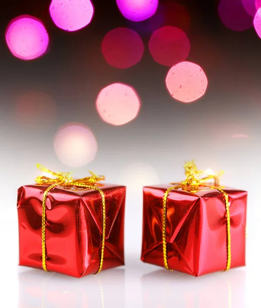 Two small red present boxes