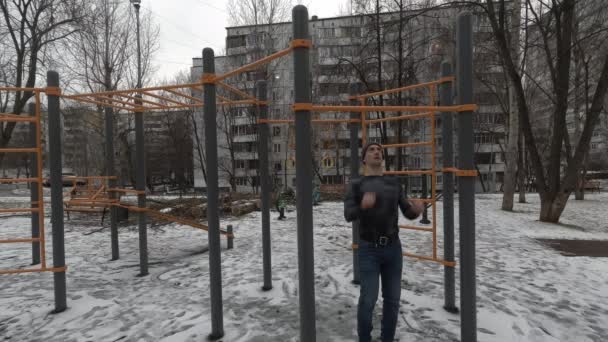 Man working out on sports ground — Stock Footage Man working out on sports ground Video Clip