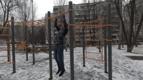 Man working out on sports ground — Stock Footage Man working out on sports ground Royalty Free Stock Video
