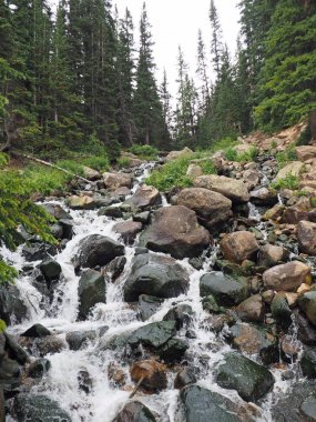 waterfall in Rockies clipart