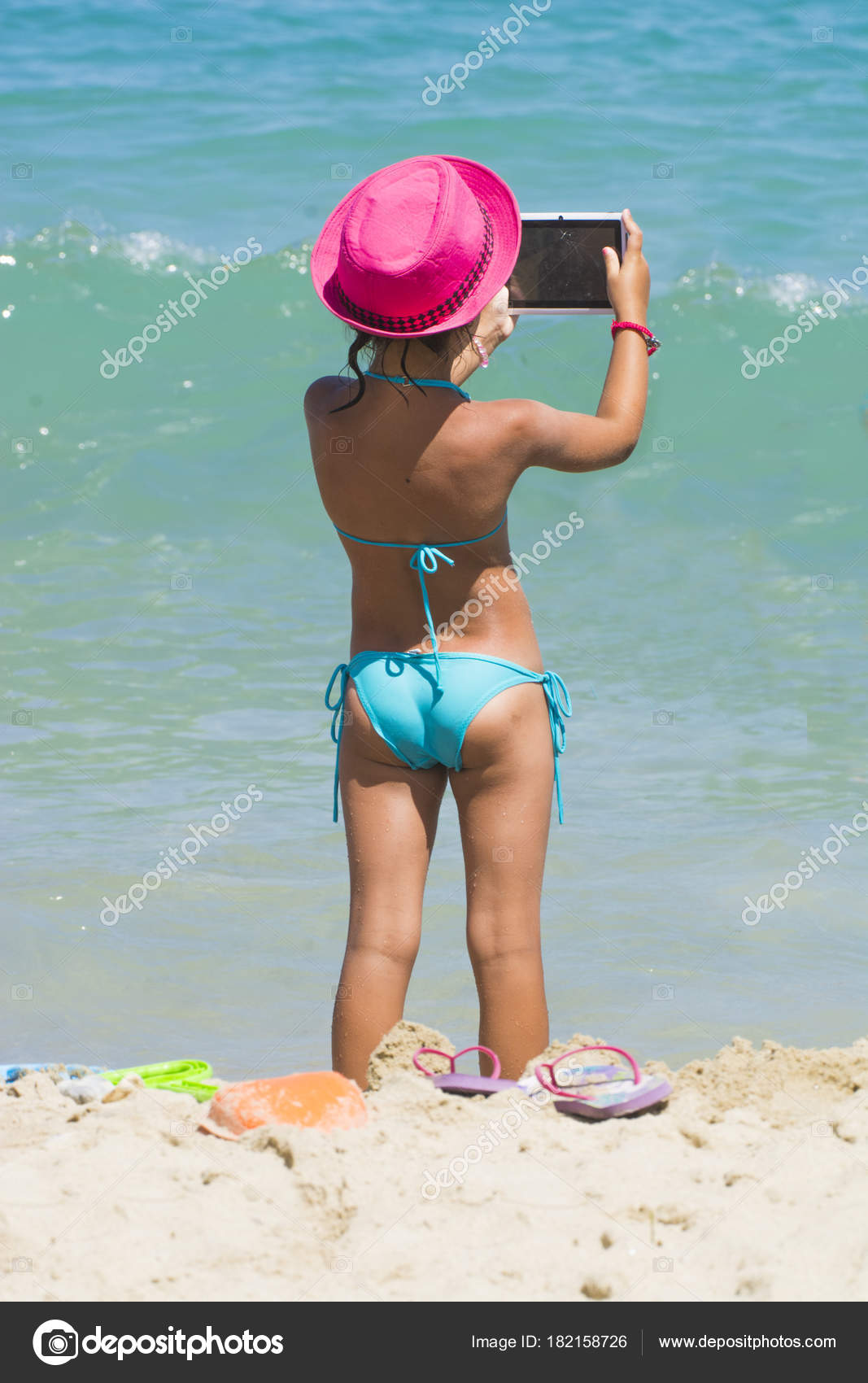 Little Girl Tablet Beach Summer Vacation Stock Photo Image By C Predrag1