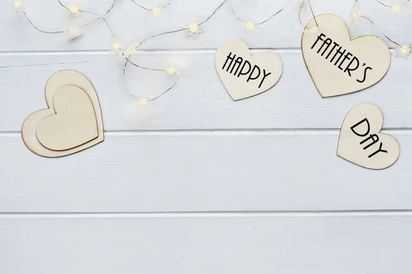 Happy Father's Day over Hearts with Fairy Lights — Stock Photo, Image