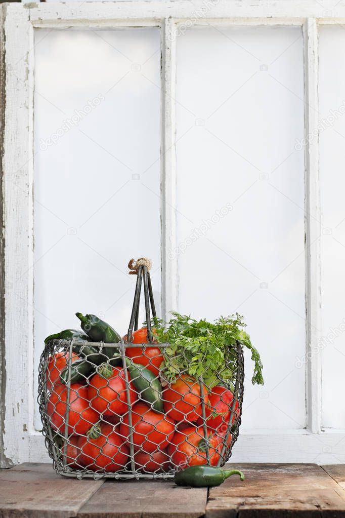 Ingredients for Homemade Salsa Against Old Window