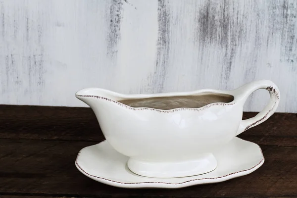 Gravy Boat on Rustic Table — Stock Photo, Image