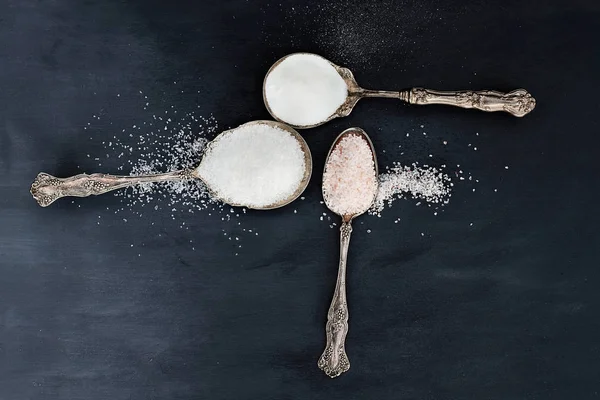 Salt Varieties in Antique Spoons — Stock Photo, Image