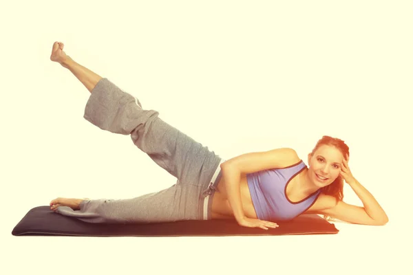 Fitness mujer haciendo ejercicio —  Fotos de Stock