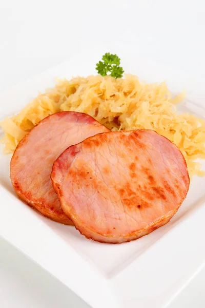 Smoked pork chop with sauerkraut — Stock Photo, Image