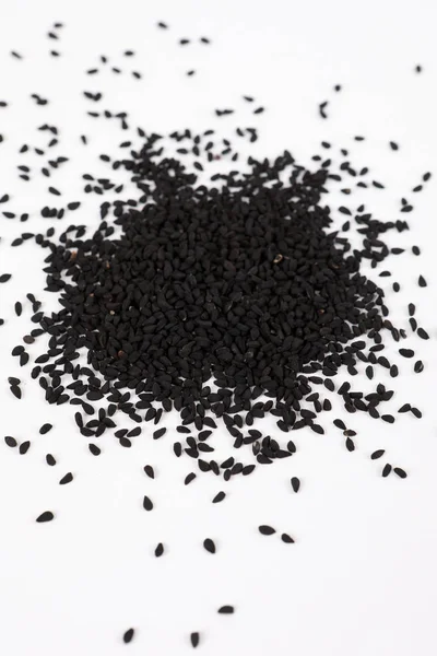Целые чёрные семена туши — стоковое фото