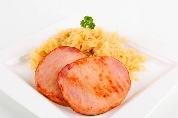 Smoked pork chop with sauerkraut — Stock Photo, Image