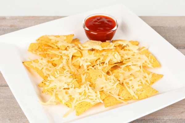Tortilla chips with sauce — Stock Photo, Image
