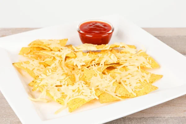 Tortilla chips with sauce — Stock Photo, Image