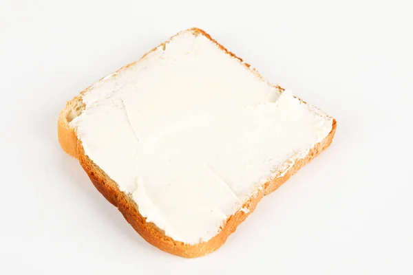 En toast med färskost — Stockfoto