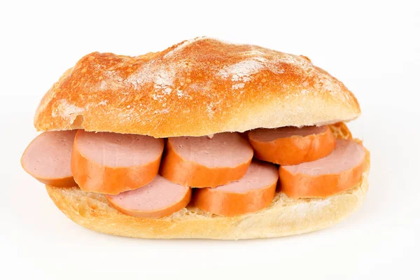 Bread topped with sausage — Stock Photo, Image