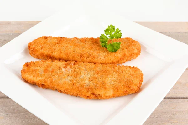 Fried fish on a plate — Stock Photo, Image