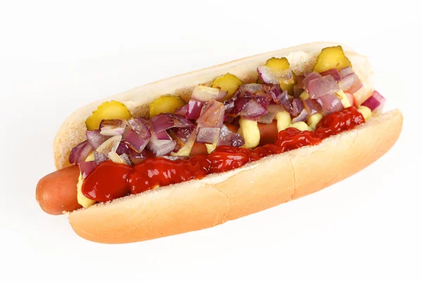 Hot dog with cucumber and onions — Stock Photo, Image