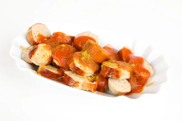 Irisan sosis dengan saus kari — Stok Foto
