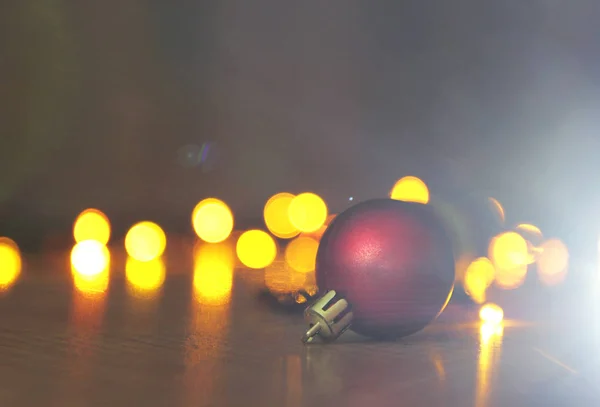 Christmas red and golden balls with bokeh — Stock Photo, Image