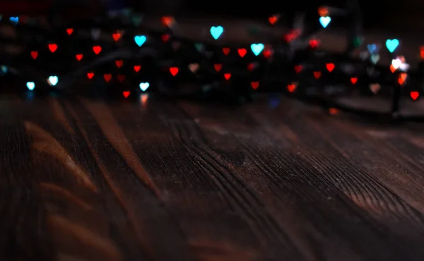 Heart bokeh, День святого Валентина концепция на деревянном фоне — стоковое фото